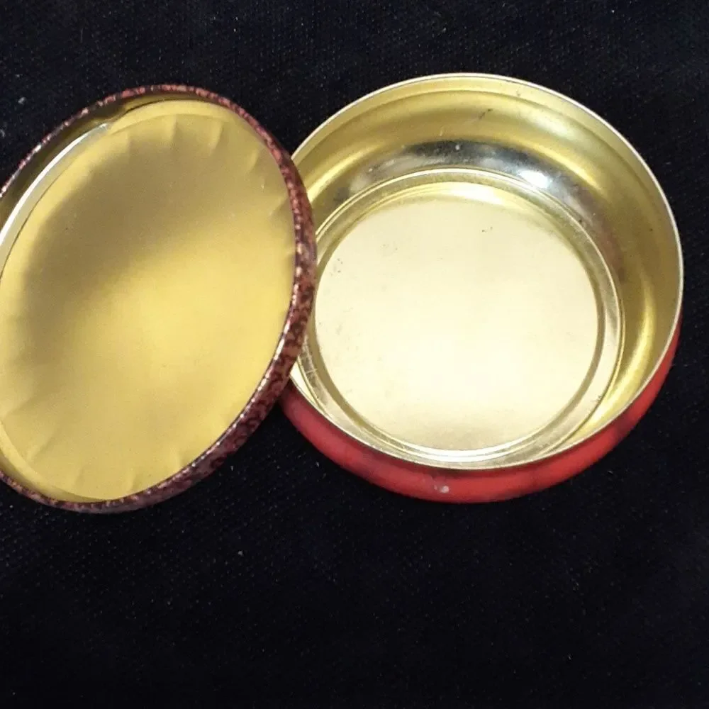 Vtg. Tins & Powder boxes & vintage‎ Avon bottle